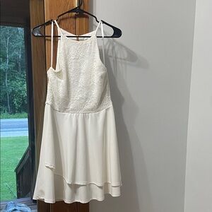 B. Smart White Dress with Delicate Details